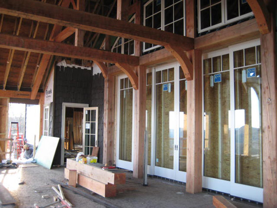 Some of the home architecture of That Architect Architect.  This construction photo shows The Architect's trademarked Grand Canyon-Dor on one of his estate projects.  This sliding door is 12' tall x 22' wide and pockets invisibly on the sides, to allow the interior space seamlessly merge with the outside space. (C)Copyright 2007-2010 That Architect, All Rights Reserved Worldwide.